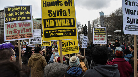 People participate in a demonstration against the recent U.S. strike in Syria, in New York, U.S., April 7, 2017. © Stephanie Keith