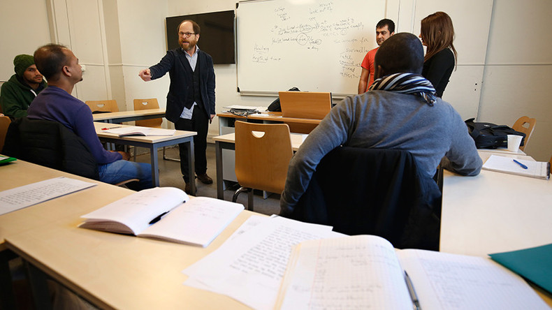 ‘Papa throws a bomb and goes to jail’: Belgian textbook for migrants comes under fire