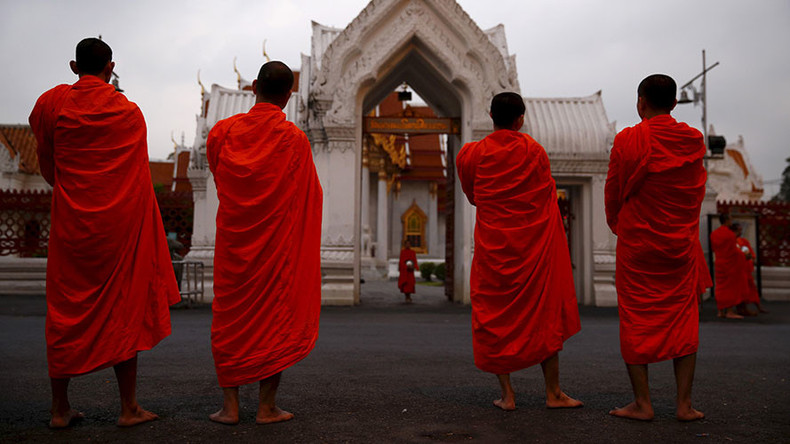 ‘Buddhist monk’ watching x-rated film on bus goes viral