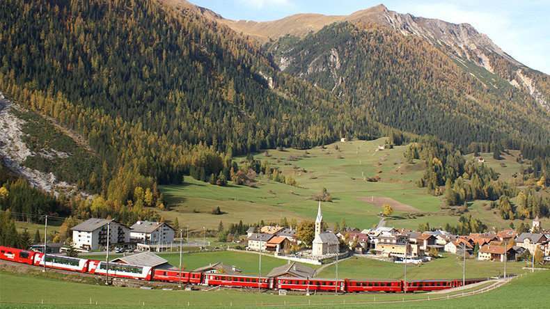 Don’t say cheese! Swiss village bans photos of scenery to avoid upsetting people who can’t visit
