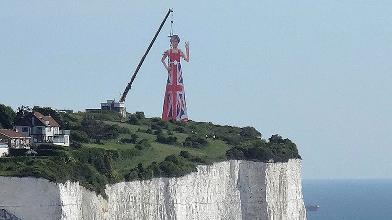 Massive effigy of Theresa May flipping V-sign at Europe erected on White Cliffs of Dover