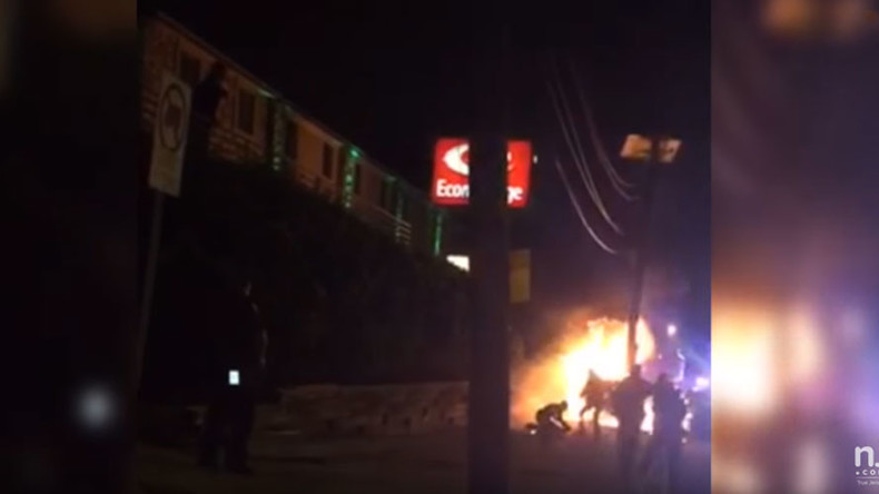 New Jersey cop kicks burning car crash victim in head (VIDEO)