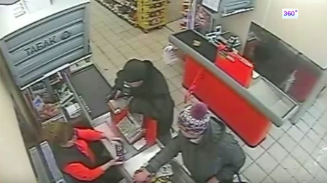Video of unfazed supermarket staff & customers at gunpoint in Russia goes viral