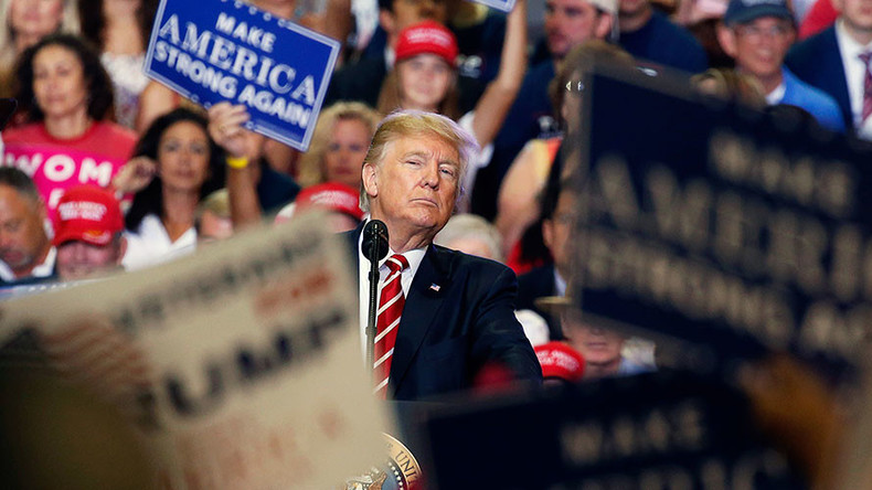 Unrepentant Trump fires back at media over Charlottesville, hints at Arpaio pardon in Phoenix