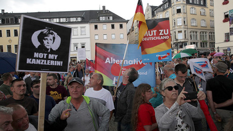 Alternative for Germany party supporters protest during the election rally of the German Chancellor Angela Merkel ) in Annaberg-Buchholz, Germany August 17, 2017 © Matthias Schumann