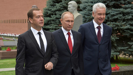 President Vladimir Putin (С), Prime Minister Dmitry Medvedev (L) and Moscow Mayor Sergei Sobyanin (R) on Red Square, Moscow.  © Alexander Astafyev