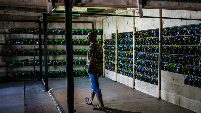 Man in a bitcoin mining facility