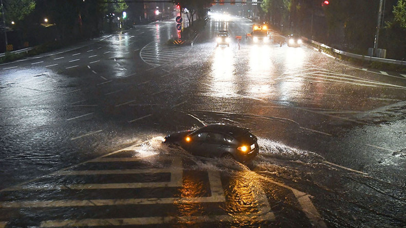 Two dead as typhoon Lan’s heavy rains & wind hit Japan (PHOTOS, VIDEO)