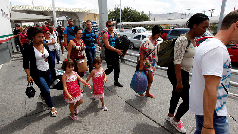 Trump signs executive order limiting refugee entry from 11 countries