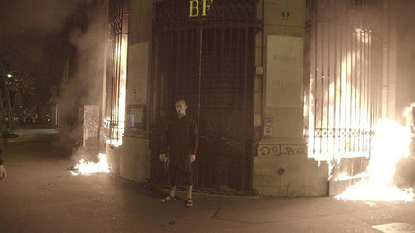 Pyromaniac artist who nailed scrotum to Red Square sets Bank of France entrance ablaze