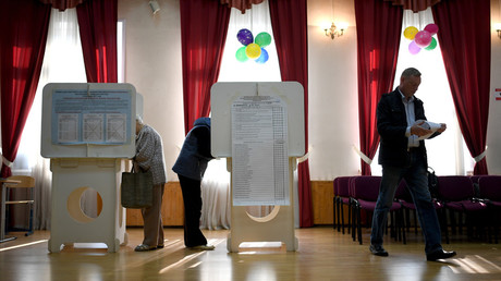 Voters at a polling station in Moscow on the single election day  Vladimir Astapkovich