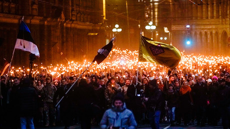 A torchlight procession in Riga, Latvia marking Independence Day © Sergey Melkonov