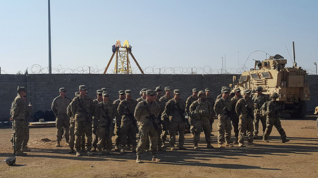 US soldiers gather at a military base north of Mosul, Iraq © Stephen Kalin