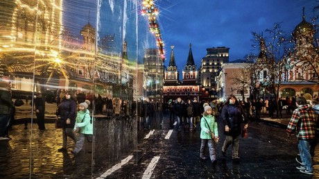 Visitors at the Red Square decorated ahead of New Year.