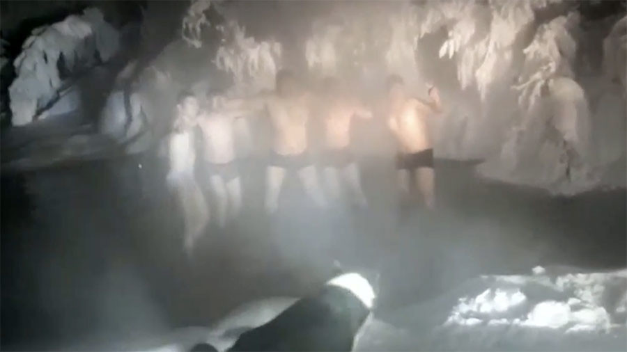 Taking a dip at -50C: Chinese tourists brave icy waters in coldest village on Earth