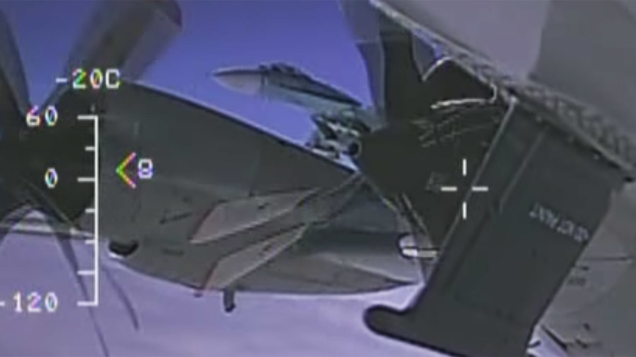 Russian Federation says Su-27 fighter jet intercepted United States spy aircraft; U.S. protests