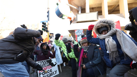 Protesters take a knee in Minneapolis, Minnesota, U.S., February 4, 2018. © Matt Blewett 