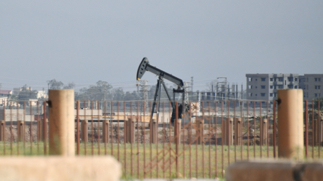 FILE PHOTO. Oil well on the outskirts of the city of Deir ez-Zor. © Mikhail Voskresenskiy 