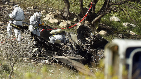 A picture shows the remains of an Israel F-16 that crashed after coming under fire by Syrian air defences during attacks against 