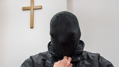 The accused former priest sits in the court room of the state court in Deggendorf, southern Germany, on February 22, 2018 © Armin Weigel / DPA / AFP