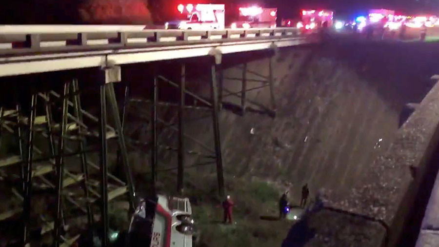 1 killed, several injured when bus with children plunges into 50-foot Alabama ravine