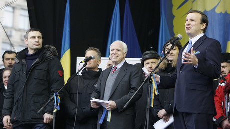 US Senators Chris Murphy and John McCain on stage with opposition activists in Kiev, Ukraine, December 2013. © Gleb Garanich