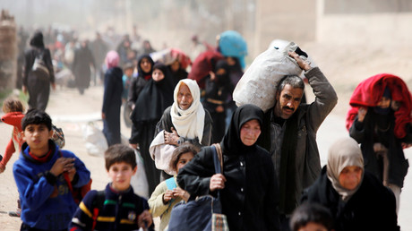 Over 30,000 leave militant-controlled E. Ghouta as people continue to flee for safety