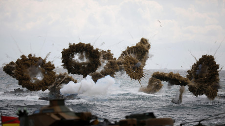 FILE PHOTO: Amphibious assault vehicles of the South Korean Marine Corps fire smoke bombs during a U.S.-South Korea joint Foal Eagle drill in 2017 ©