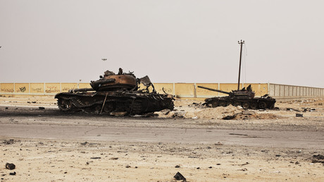 FILE PHOTO. Libyan government tanks destroyed by Western air strikes in 2011. © Finbarr O'Reilly