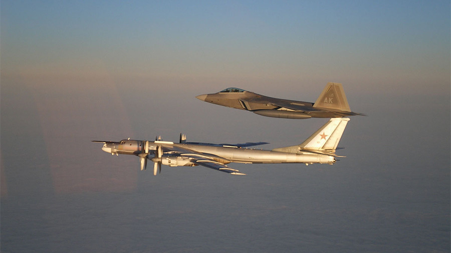 Russian strategic bombers escorted by US F-22 over neutral Arctic waters â€“ MoD
