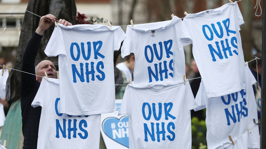 May tells public to ‘celebrate’ privatization in NHS as Hawking campaign hits high court (VIDEO)
