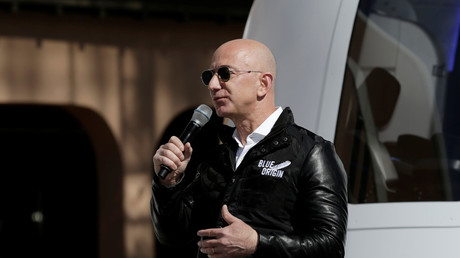 Amazon and Blue Origin founder Jeff Bezos addresses the media about the New Shepard rocket booster and Crew Capsule mockup at the 33rd Space Symposium in Colorado Springs, Colorado, United States April 5, 2017. © Isaiah J. Downing