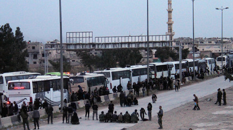 FILE PHOTO: Buses transport militants and their families from Eastern Ghouta © Ammar Safarjalani