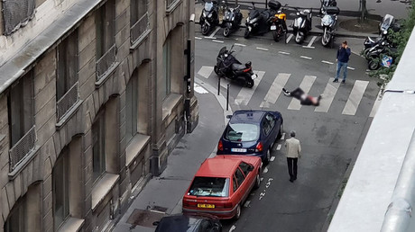  A wounded man is seen on Rue Marsollier in Paris, France May 12, 2018 @ Dezouzart / Twitter / Reuters