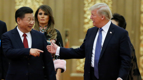 US President Donald Trump and China's President Xi Jinping arrive at a state dinner at the Great Hall of the People in Beijing, China, November 9, 2017 © Thomas Peter