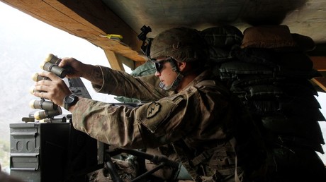 A US soldier reloads his MK19 40MM automatic grenade launcher. ©Erik De Castro