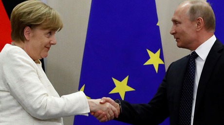 Russian President Vladimir Putin and German Chancellor Angela Merkel s© Sergei Karpukhin