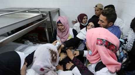 Colleagues of Palestinian nurse Razan Al-Najar react to her death © Ibraheem Abu Mustafa