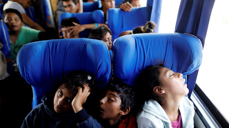 Central American children riding a bus through Mexico to the US border on April 6, 2018. © Edgard Garrido
