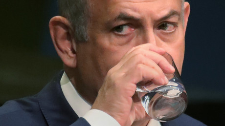 FILE PHOTO: Israel's Prime Minister Benjamin Netanyahu takes a drink of water as he addresses the UN General Assembly on September 22, 2016. © Carlo Allegri