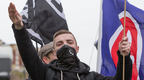 A member of the banned neo-nazi group National Action. © Joel Goodman