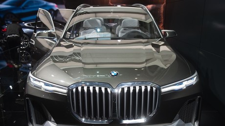 Driving to the pearly gates? PHOTO shows Nigerian man 'burying father in brand new BMW'