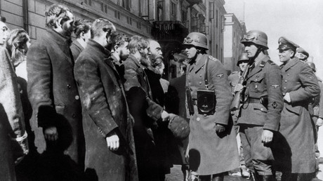 Nazi German soldiers question Jews after the Warsaw Ghetto Uprising, 1943