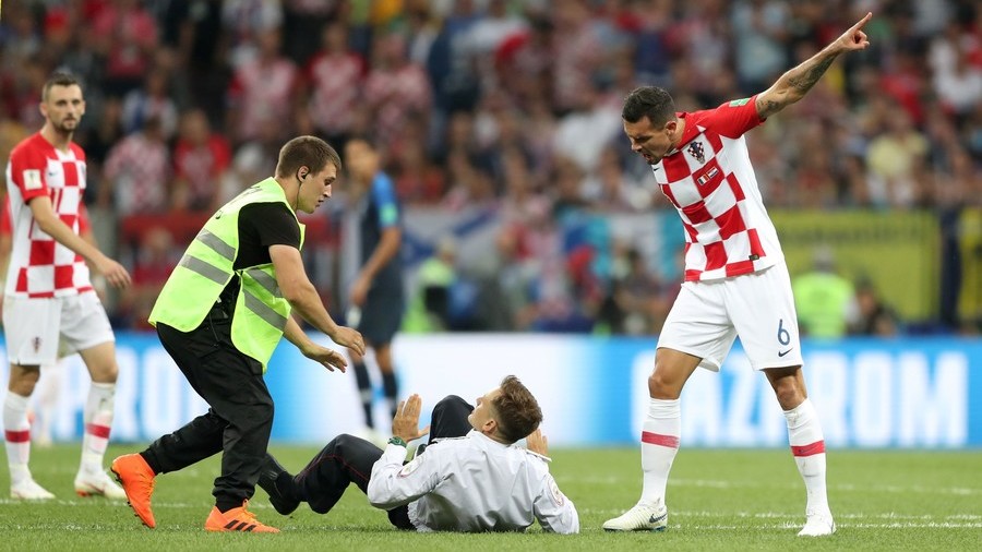Pussy Riot face charges of illegal use of uniforms after World Cup pitch invasion