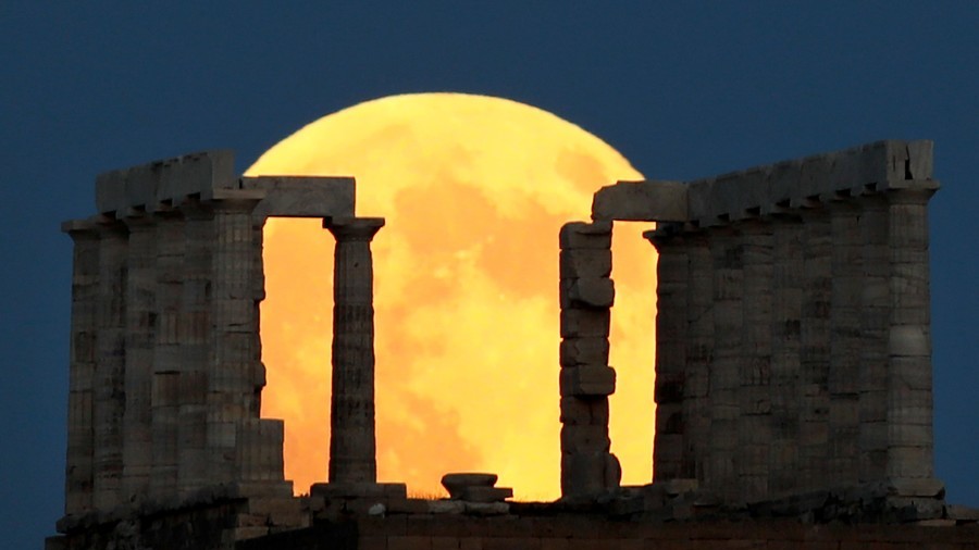 Blood Moon rising Longest lunar eclipse of the century burns dark red