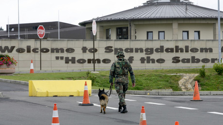 FILE PHOTO: A US soldier patrols Spangdahlem air base in western Germany © Ina Fassbender