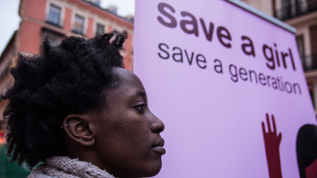 A woman protesting in Madrid, Spain, during the International Day against female genital mutilation.  © Pacific Press / Getty