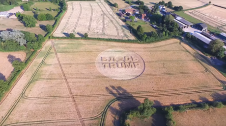 Greeted with protests & ‘Tr*mp Trump’ crop circle, US leader feels ‘unwelcome’ in UK (VIDEOS)