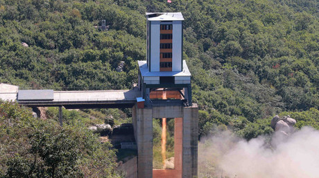 FILE PHOTO: A demonstration of a new rocket engine for the geo-stationary satellite at the Sohae Space Center in Pyongyang © KCNA 