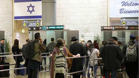 FILE PHOTO: Arriving passengers queueing to present their travel documents before passport control at Ben Gurion International Airport on the outskirts of Tel Aviv. © Jack Guez